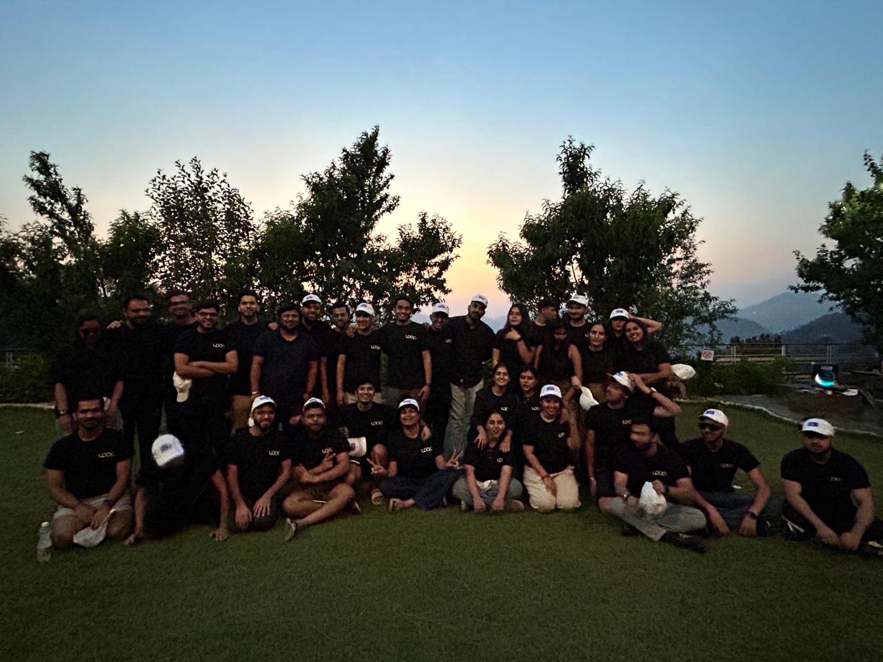 Team retreat at sunset in the mountains