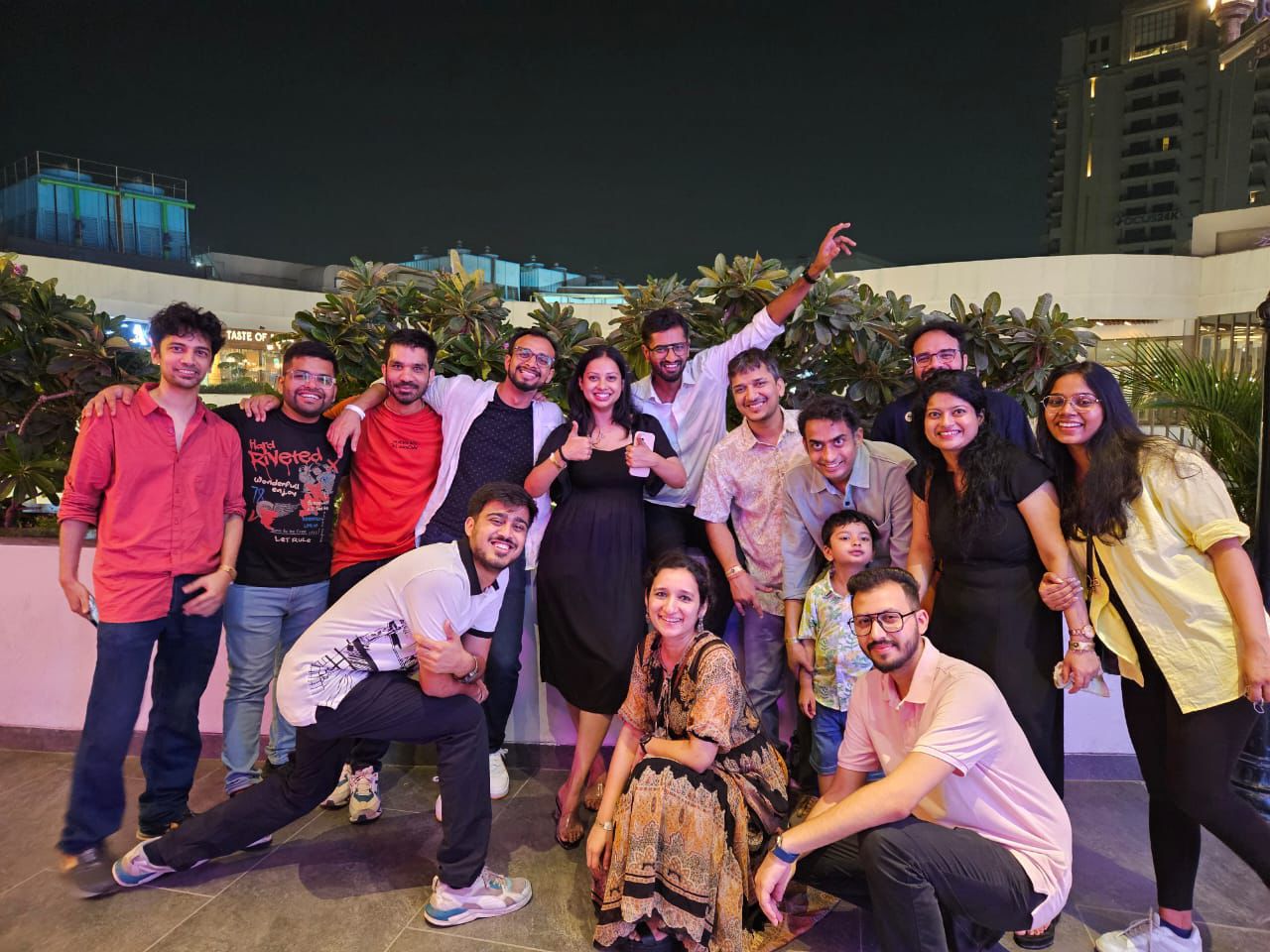 Rooftop night gathering with the team