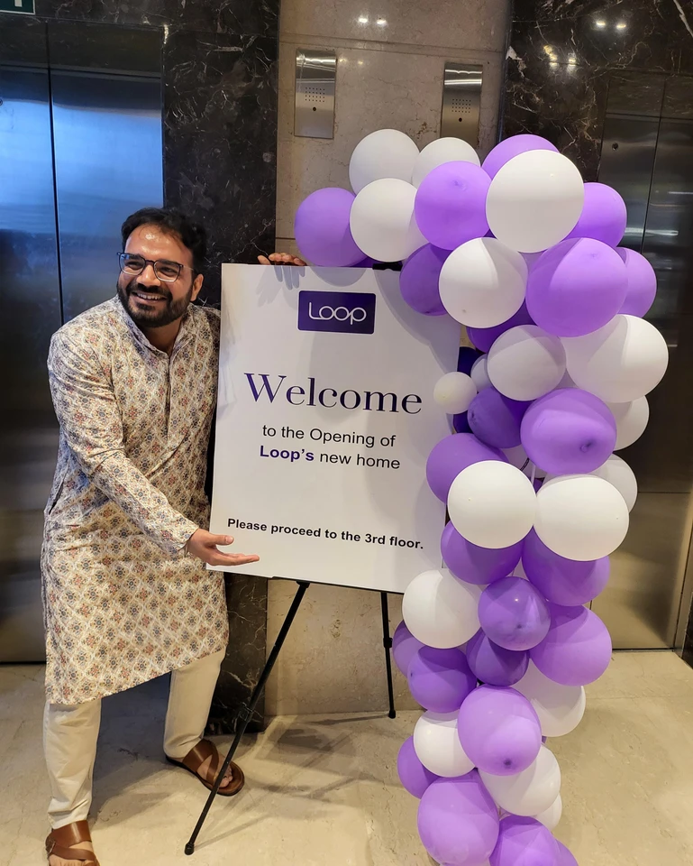 New office launch with Loop balloons and welcome sign